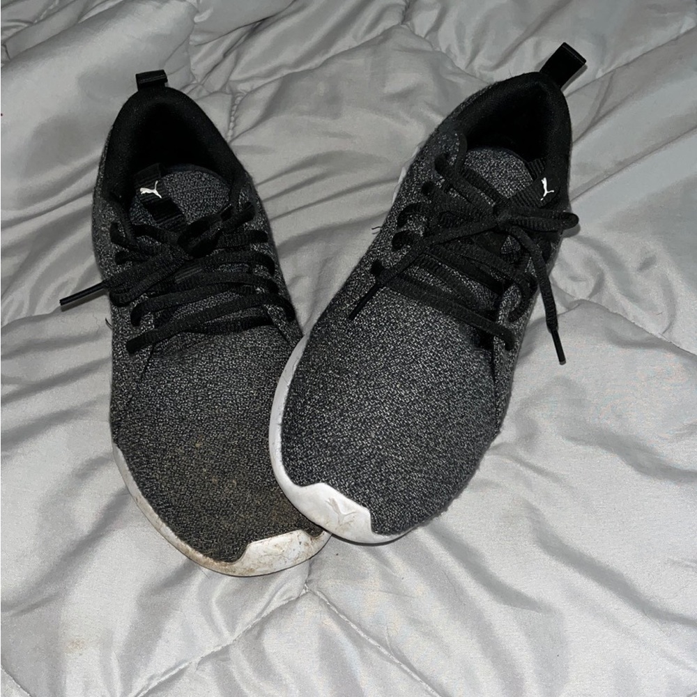 Black and white puma shoes
